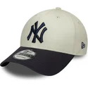 new-era-curved-brim-9forty-side-script-new-york-yankees-mlb-beige-and-navy-blue-adjustable-cap