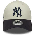new-era-curved-brim-9forty-side-script-new-york-yankees-mlb-beige-and-navy-blue-adjustable-cap