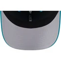 new-era-9seventy-stretch-snap-evergreen-helmet-miami-dolphins-nfl-blue-trucker-hat