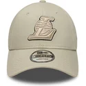 new-era-curved-brim-9forty-team-outline-los-angeles-lakers-nba-beige-adjustable-cap-with-beige-logo