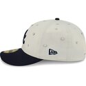 new-era-curved-brim-59fifty-beads-na-lifestyle-f1-atlanta-braves-mlb-beige-and-navy-blue-fitted-cap
