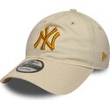 new-era-curved-brim-golden-logo-9twenty-league-essential-new-york-yankees-mlb-beige-adjustable-cap